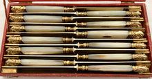 First Half 19th Century Cased Set of Twelve French Silver Gilt, Rose Gold & Carved Mother of Pearl Knives.