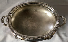 Magnificent 19th century, twin handled, silver plated soup tureen and cover of oval bombe form.