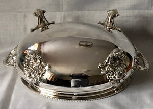 Magnificent 19th century, twin handled, silver plated soup tureen and cover of oval bombe form.