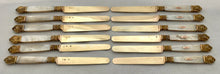 First Half 19th Century Cased Set of Twelve French Silver Gilt, Rose Gold & Carved Mother of Pearl Knives.