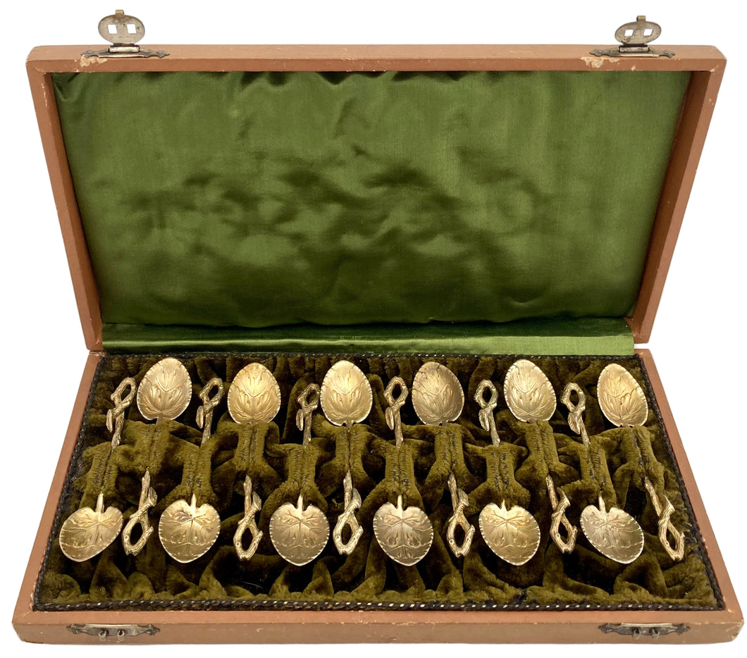 Twelve Naturalistic Leaf & Vine Form Gilt Metal Teaspoons, circa 1870 - 1890.