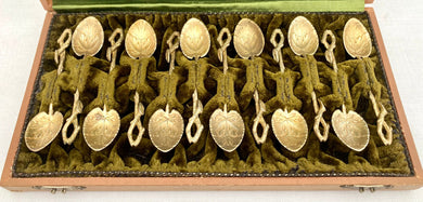 Victorian Cased Set of Twelve Naturalistic Leaf & Vine Form Gilt Metal Teaspoons, circa 1870 - 1890.