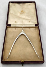 Edwardian Cased Pair of Silver Wishbone Sugar Nips. London 1904 Charles & George Asprey.