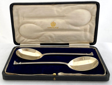George V Cased Pair of Silver Gilt Seal Top Serving Spoons. London 1917 Josiah Williams & Co. 2.9 troy ounces.
