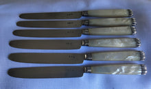 Georgian, George III, set of six silver bladed and mother of pearl hafted knives. Sheffield 1815/17.
