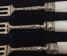 George V cased set of six silver and mother of pearl dessert knives and forks. London 1930 Goldsmiths & Silversmiths Co.