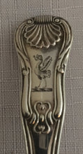 Georgian, George III, set of six silver heavy gauge Kings pattern crested teaspoons. London 1818 Thomas Barker. 7 troy ounces.