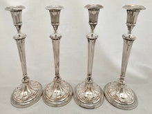 Georgian, George III, Set of Four Adam Style Old Sheffield Plate Candlesticks, circa 1790 - 1800.