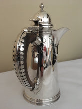 George V silver chocolate pot. London 1917 Sebastian Garrard. 19.7 troy ounces.