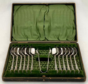 Twelve Victorian Naturalistic Double Struck Teaspoons & Sugar Tongs, circa 1880 - 1900.