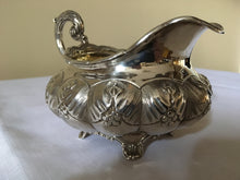 William IV silver cream jug of squat melon form. London 1831 Robert Hennell II. 8.19 troy ounces.