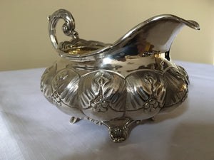 William IV silver cream jug of squat melon form. London 1831 Robert Hennell II. 8.19 troy ounces.